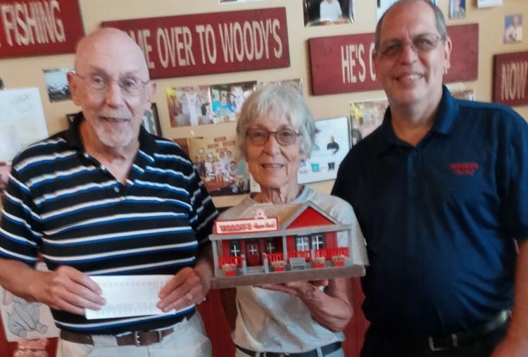 Woody’s Bar-B-Q Franchisees Donate to Habitat for Humanity